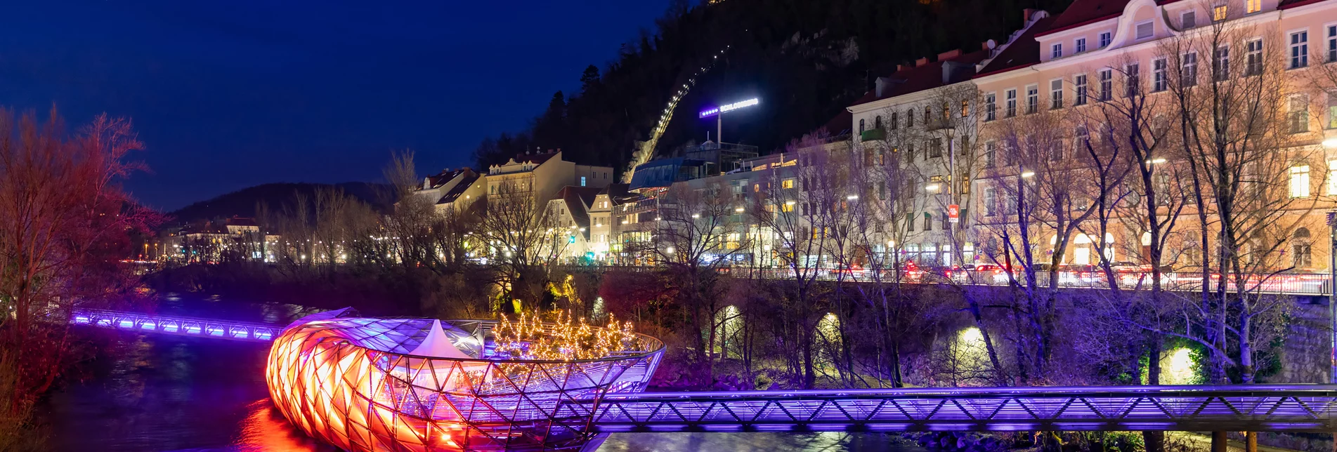 Murinsel mit Grazer Schloßberg | © Graz Tourismus | Harry Schiffer